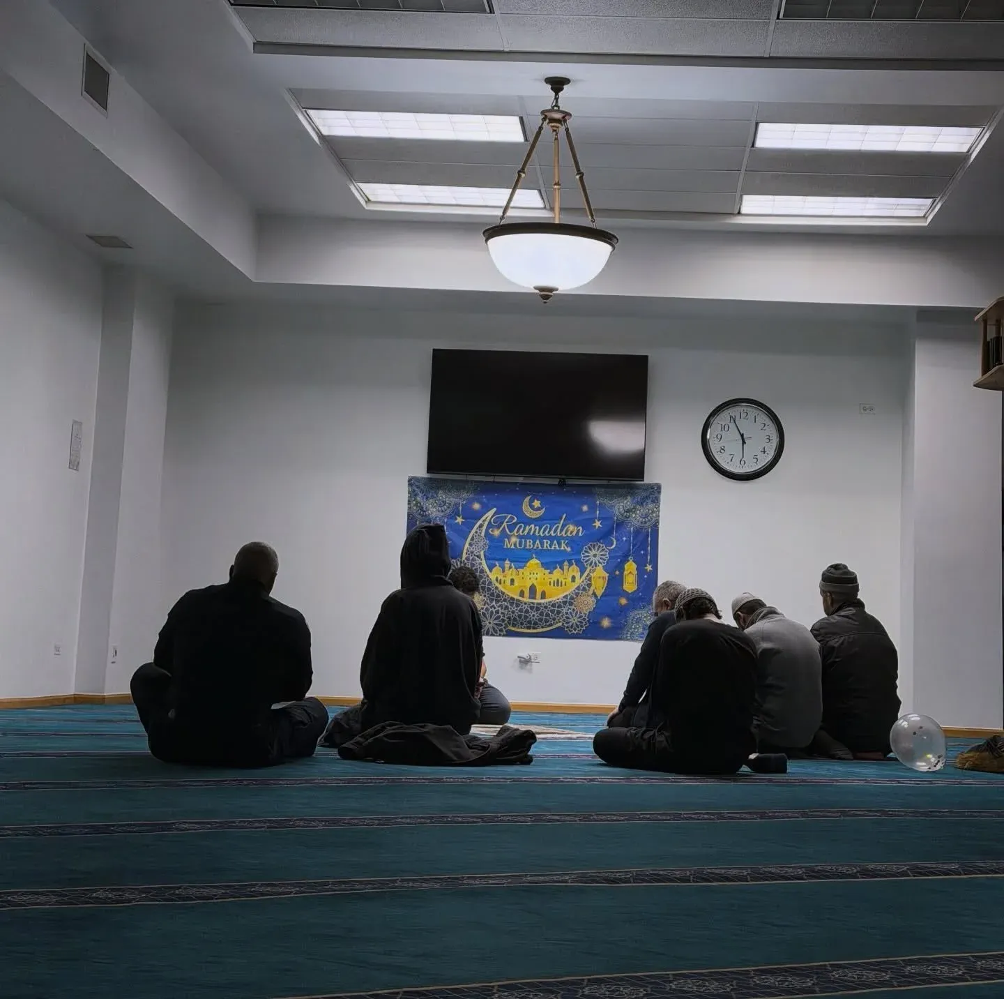 Worshippers in prayer at DIC