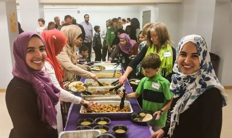Community members sharing an iftar meal at DIC